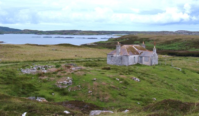 Disused bothy by the shore A track leads from the road end past a house and down to the shore opposite the small island of Orasaigh Uisgeabheag. This tin roofed bothy is not yet falling into ruin.