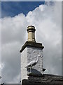 Stork by the chimney