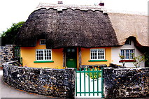 R4646 : Adare Main Street - Yellow, White & Green Cottage Dwelling by Joseph Mischyshyn