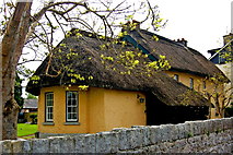 R4646 : Adare - Main Street - Yellow Thatched-Roof Cottage Dwelling  by Joseph Mischyshyn
