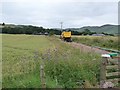 Wheat field and farm machinery at Linton Farm