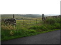 Gate leading to a field of very rough grazing