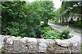 The road into West Burton seen from Burton Bridge