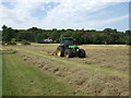 TL8162 : Turning hay north of Ickworth Park by Richard Humphrey