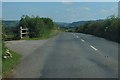 The B4060 passing the entrance to Day House Farm