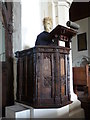 Twenty first century scarecrow preaches in 14th century pulpit, St Mary