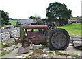 Old tractor at a farm entrance in Coplow Dale