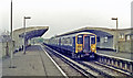 Chessington North station, with train, 1985