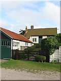 TQ4701 : Norton Cottage by Simon Carey