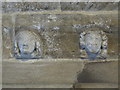 NZ0066 : Aydon Castle - carved heads above fireplace by Mike Quinn