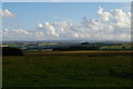 NY8671 : Looking south towards the Tyne valley, from the car park at Brocolitia Roman fort by Christopher Hilton