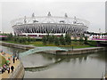 TQ3784 : Footbridge over City Mills River by Olympic Stadium by David Hawgood