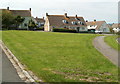 Houses facing a grass triangle, Locking