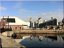 SJ3389 : New buildings overshadow the old dock by Andrew Abbott