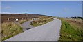 NH5639 : Great Glen Way and minor road, by Altourie by Craig Wallace
