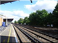 The up platform at Raynes Park station