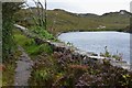 NC1638 : Old road and Loch Duartbeg by Jim Barton