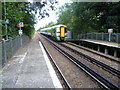 A Southern train approaches Leigh station