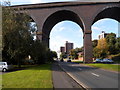 Multi-storey flats viewed through arches of Kidderminster Viaduct