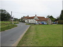 TG0442 : Wiveton village by Pauline E