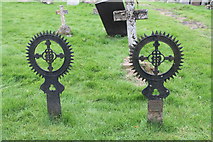 SK9227 : Unusual Iron Grave markers, Ss Andrew & Mary's churchyard by J.Hannan-Briggs