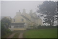 House in East Prawle on a misty day