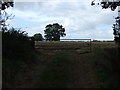 SP4585 : Field entrance off the Fosse Way by JThomas