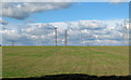 Arable field with pylons