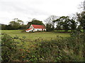 Traditional cottage on the north side of Corcreaghan Road