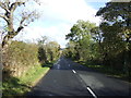 NZ0186 : Road heading towards the B6342 and Cambo by JThomas