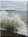 SZ2991 : Milford on Sea: a wave hits the sea wall by Chris Downer
