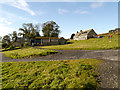 NY7868 : Approaching Housesteads Farm and Museum by David Dixon