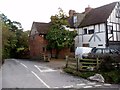 Rambling building next to the Black Horse inn , Detling