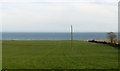 J3720 : Field between Glasdrumman Road (A2) and the sea by Eric Jones