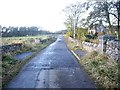 Road bridge over sluice outflow from Loch of Skene