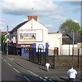 Murals on the Alpha Taxis building on Shankill Road