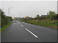 The B6345 road entering Amble