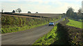 2012 : Heading south from the top of Portway Hill