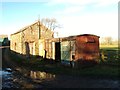 Old railway goods van and barn at Frolar Meadows