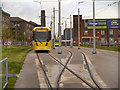 SJ8497 : Tram on Test by David Dixon