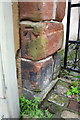 Benchmark on gate post next to #76 High Street