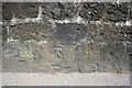 Benchmark on wall of Skipton Road