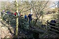 Walkers crossing Stile and Footbridge