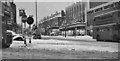 TQ2691 : Northward up High Road North Finchley at Tally-Ho Corner, after heavy snowfall, 1962 by Ben Brooksbank