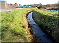 Afon Fach flows towards Pyle railway station footpath