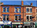 Hucknall - shops on High Street at Station Road junction