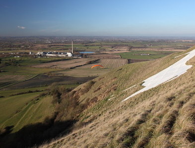 ST8951 : View over the Westbury White Horse towards the Cement Works by Doug Lee