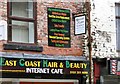 SJ9494 : Signs above East Coast Hair & Beauty Internet Cafe by Gerald England
