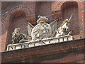 Royal arms and date stone (1793) on the Chapel Royal, Princes Place, BN1