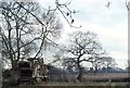 SJ6642 : Old threshing machine, Wood Orchard Lane, Audlem by Christopher Hilton